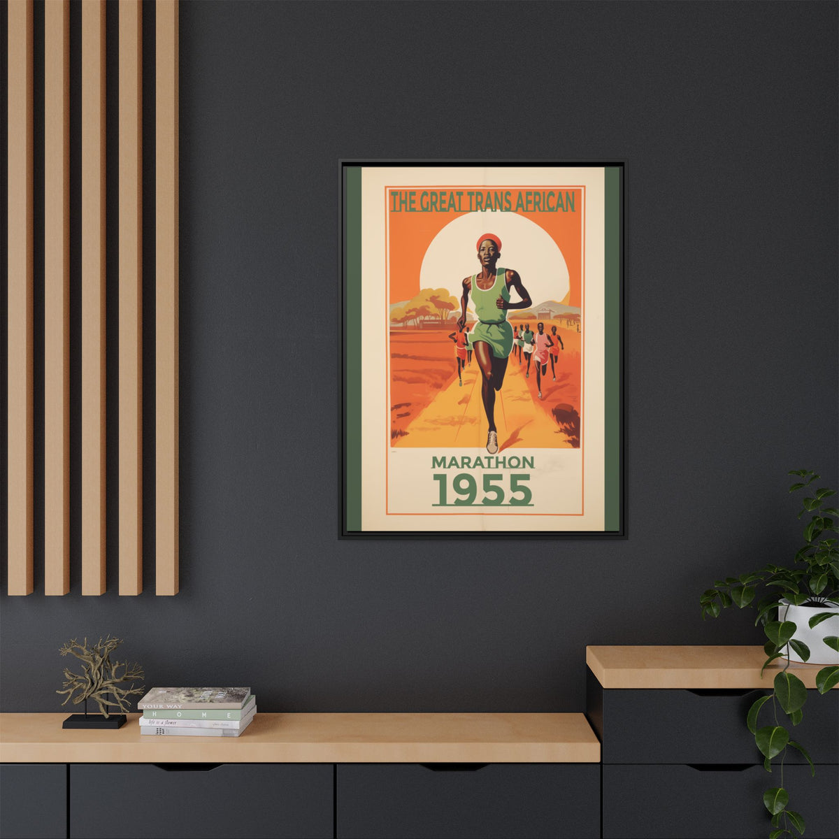 Vintage 1955 Great Trans African Marathon artwork, 30 × 40, black framed canvas, displayed on a dark charcoal wall above a light wood bench