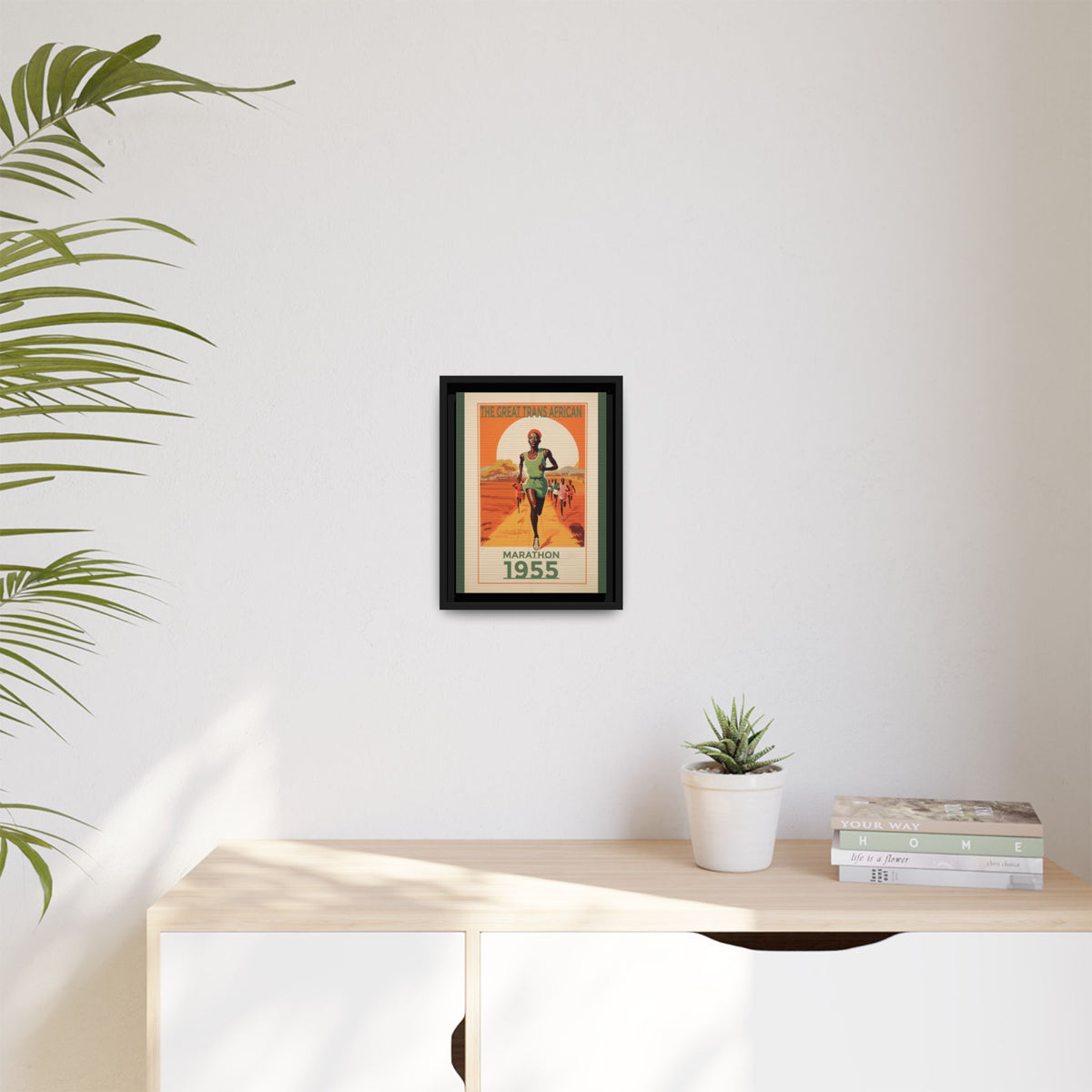 Vintage 1955 Great Trans African Marathon artwork, 9 × 12, black framed canvas, displayed on a pale wall above a light wood sideboard