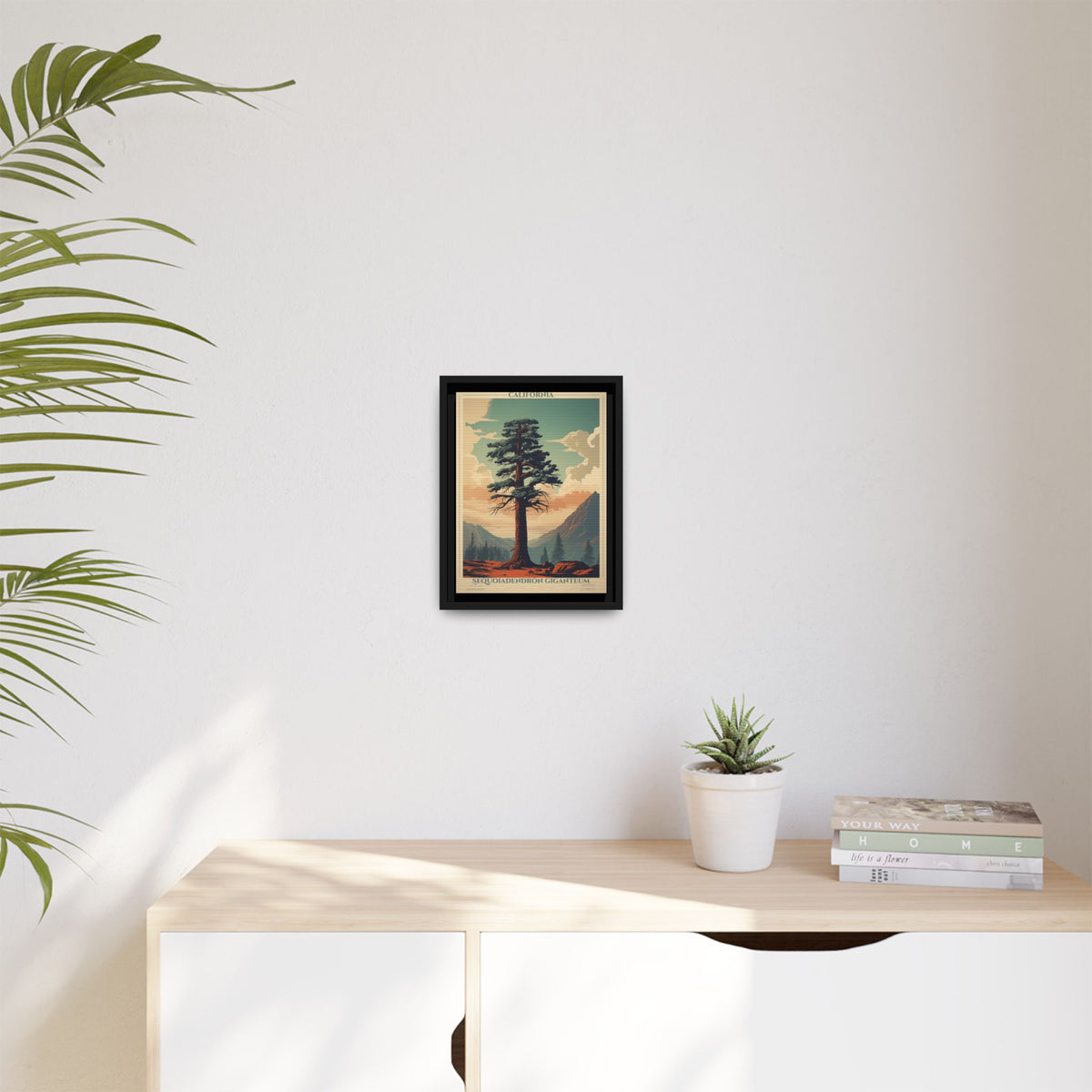 California Sequoiadendron Giganteum vintage nature artwork, 9 × 12, black framed canvas, displayed on a white wall above a low cabinet, beside a potted plant in daylight