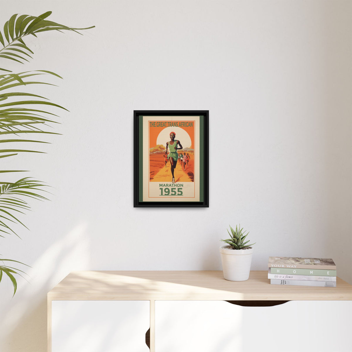 Vintage 1955 Great Trans African Marathon artwork, 12 × 16, black framed canvas, displayed on a pale wall above a light wood sideboard