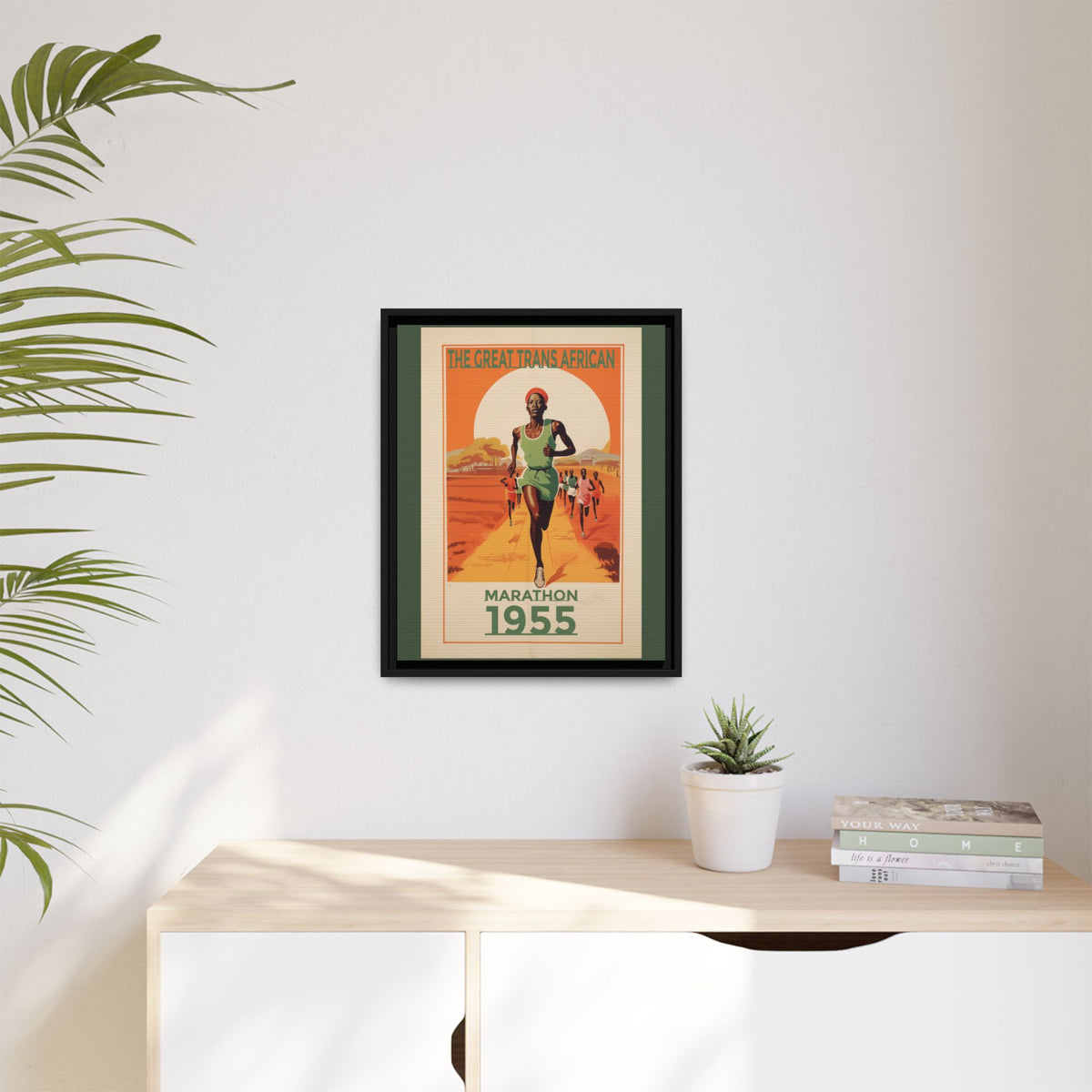 Vintage 1955 Great Trans African Marathon artwork, 16 × 20, black framed canvas, displayed on a pale wall above a light wood sideboard