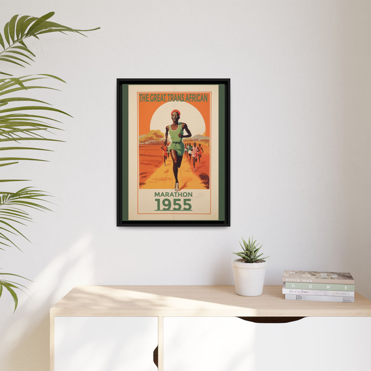Vintage 1955 Great Trans African Marathon artwork, 18 × 24, black framed canvas, displayed on a pale wall above a light wood sideboard
