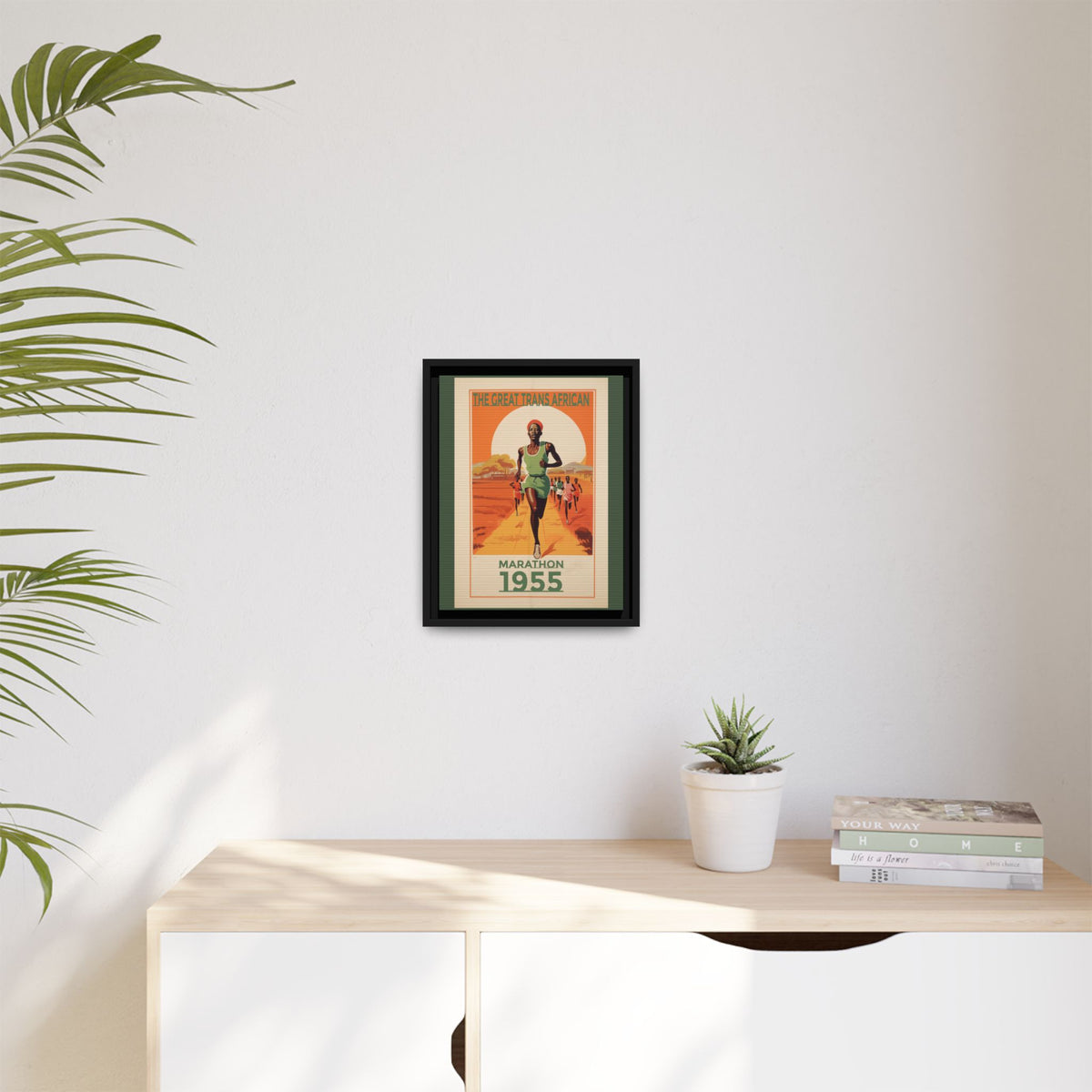 Vintage 1955 Great Trans African Marathon artwork, 11 × 14, black framed canvas, displayed on a pale wall above a light wood sideboard