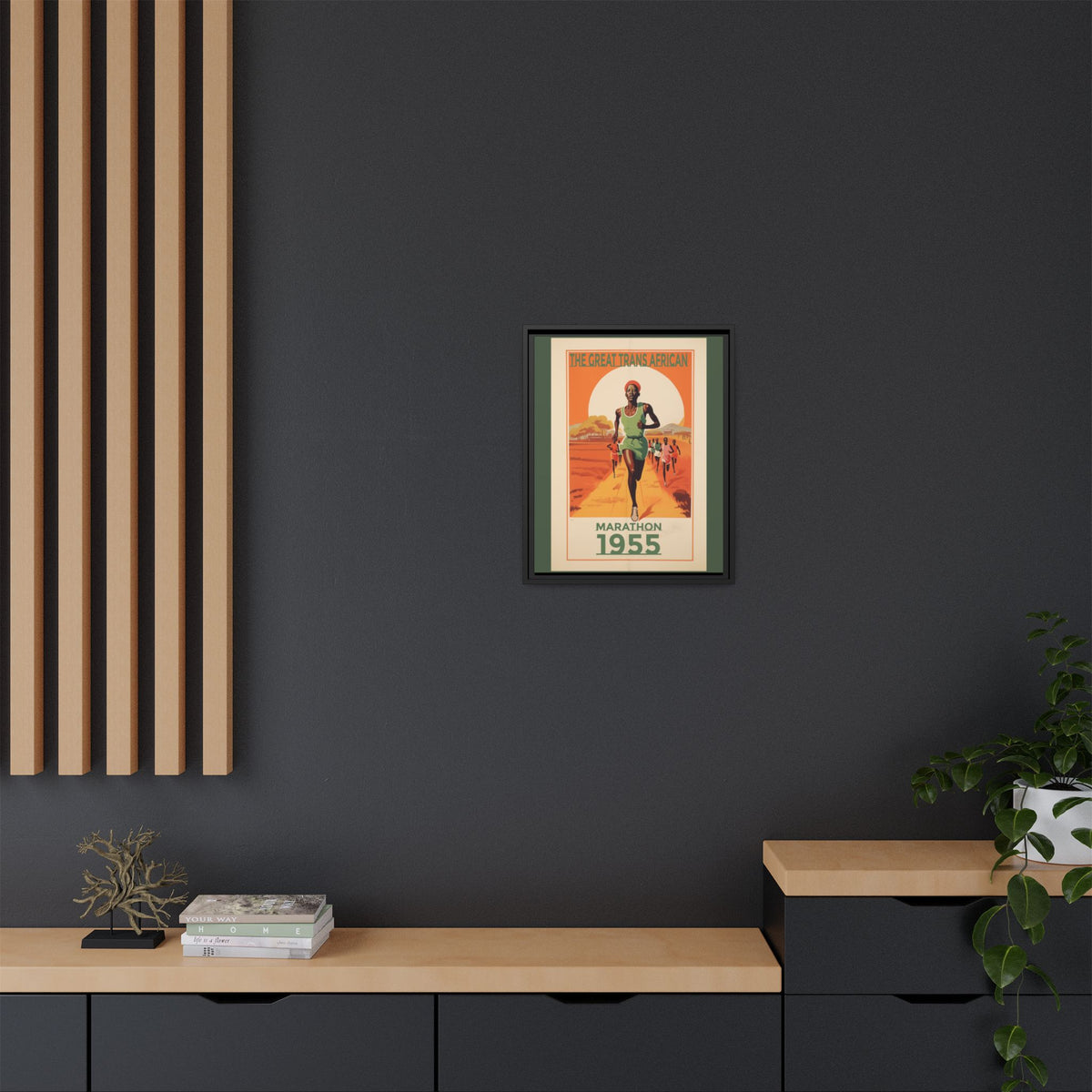 Vintage 1955 Great Trans African Marathon artwork, 16 × 20, black framed canvas, displayed on a dark charcoal wall above a light wood bench